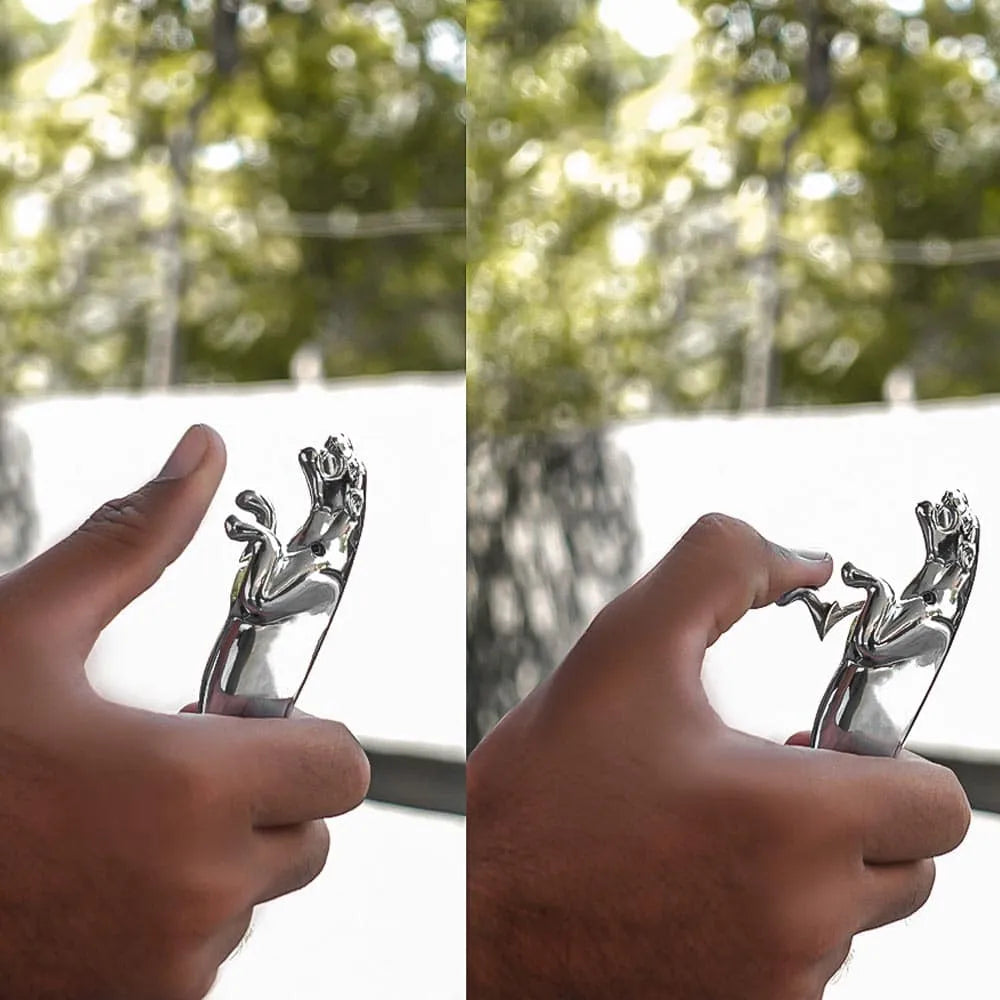 Two views of a hand holding a silver metal sculpture against a blurred outdoor background.