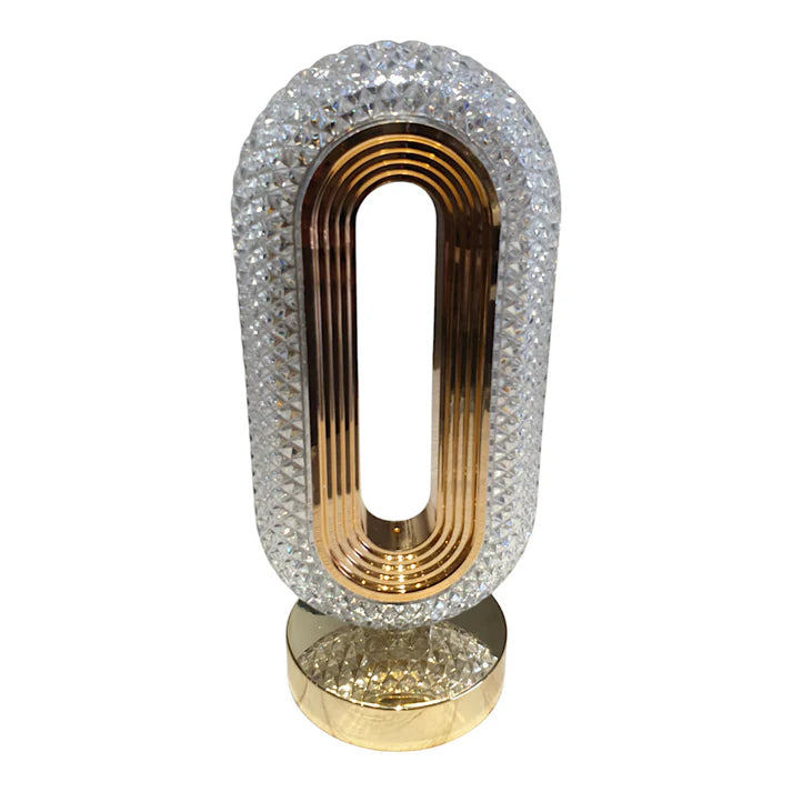 Decorative object with crystal embellishments and gold accents on a white background