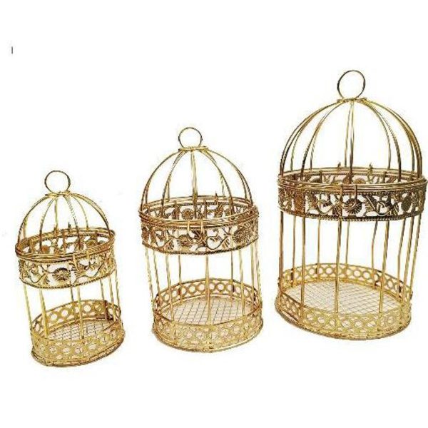 Set of three gold decorative birdcages on a white background