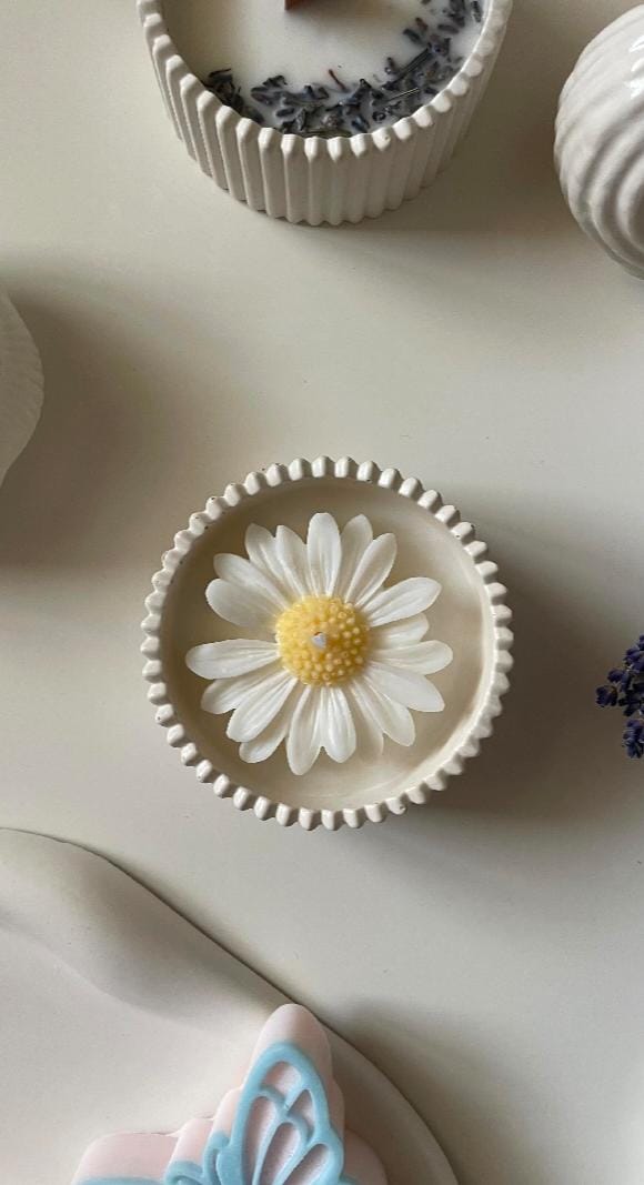 Decorative flower-shaped object on a light surface