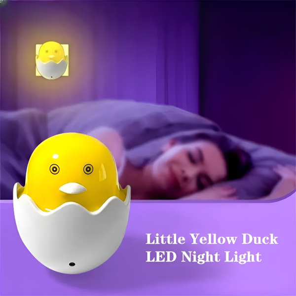 Yellow duck LED night light with a person sleeping in the background