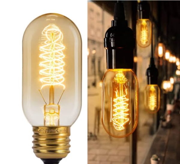 Vintage-style light bulbs with spiral filaments on a white background
