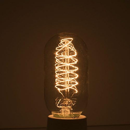 Vintage-style light bulb with coiled filament on a dark background