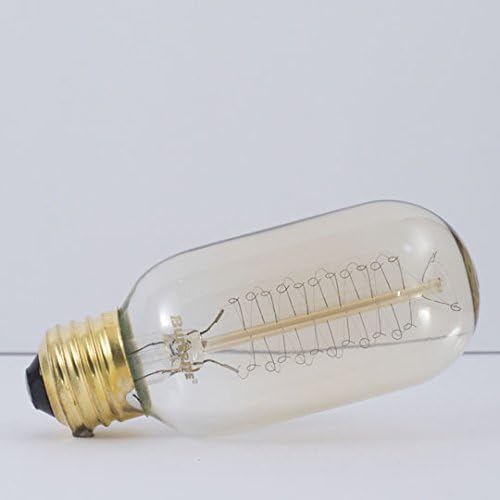Clear light bulb with visible filament on a white background