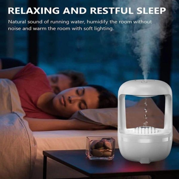Person sleeping with a humidifier on a table, text about relaxing and restful sleep.
