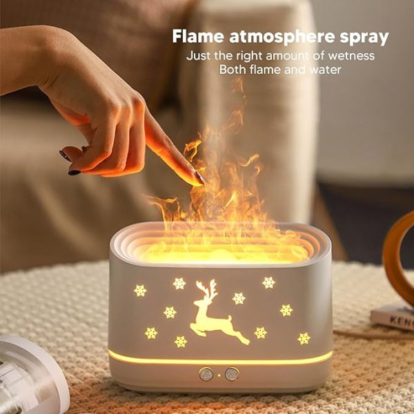 Flame atmosphere spray with a reindeer design on a textured surface.