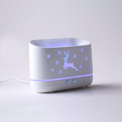 White electronic device with deer and snowflake design on a light gray background