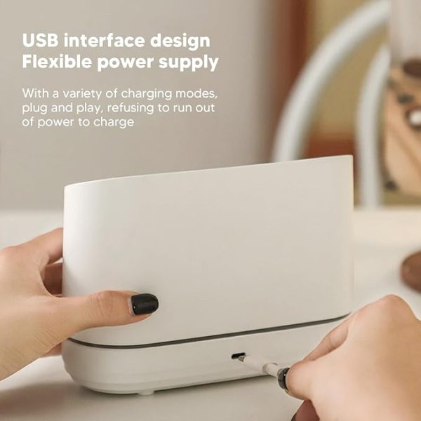 Person plugging a cable into a white electronic device with text about USB interface design and flexible power supply.