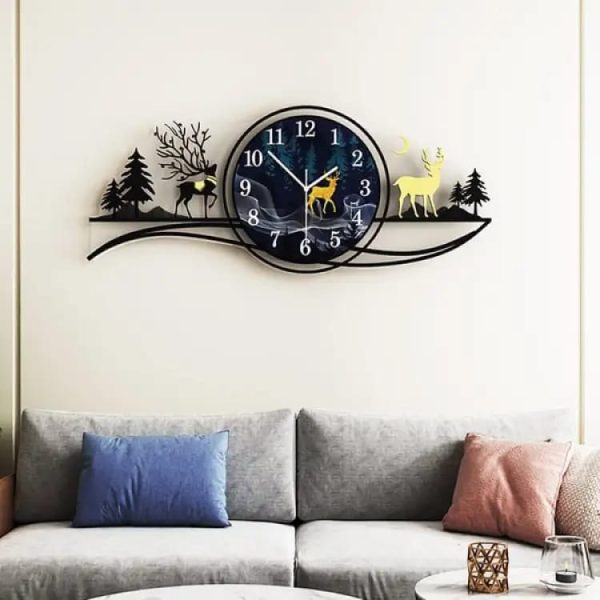Decorative wall clock with nature design on a wall above a sofa.