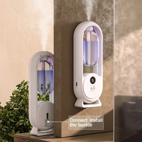 Wall-mounted humidifier with water tank and mist output on a neutral background